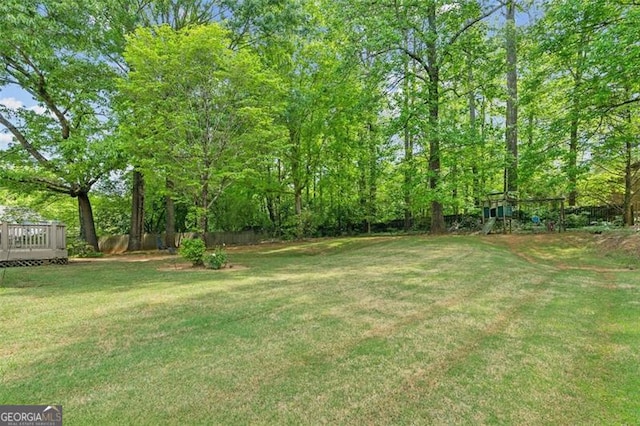 22 Oakwood Hills Dr, Suwanee, GA 30024 - view of yard with a playground and a deck