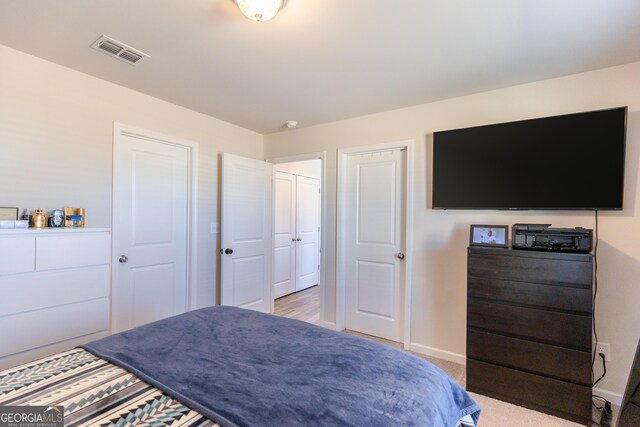 104 Catalpa Rd, Milner, GA 30257 - bedroom featuring carpet floors, visible vents, and baseboards