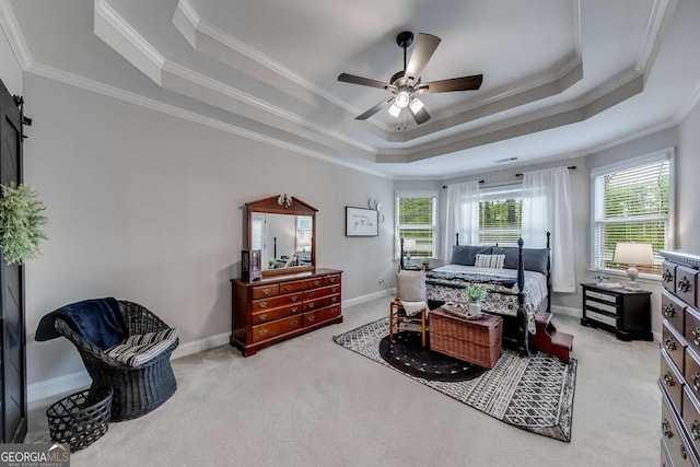 1738 Honey Tree Pl, Hoschton, GA 30548 - carpeted bedroom with a raised ceiling, multiple windows, ornamental molding, and ceiling fan