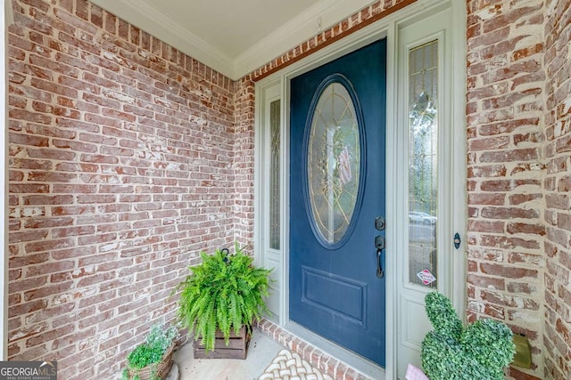1738 Honey Tree Pl, Hoschton, GA 30548 - doorway to property featuring brick siding and covered porch