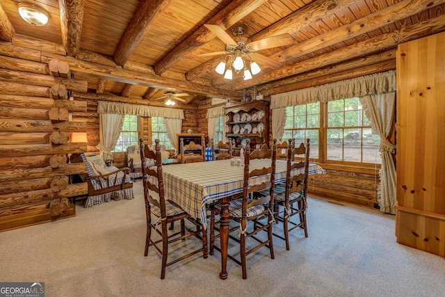 dining area featuring log walls, carpet, wood ceiling, and ceiling fan