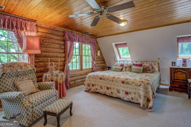 bedroom featuring rustic walls, visible vents, wooden ceiling, and multiple windows