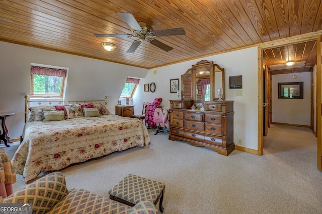 carpeted bedroom with baseboards, wooden ceiling, ornamental molding, and multiple windows