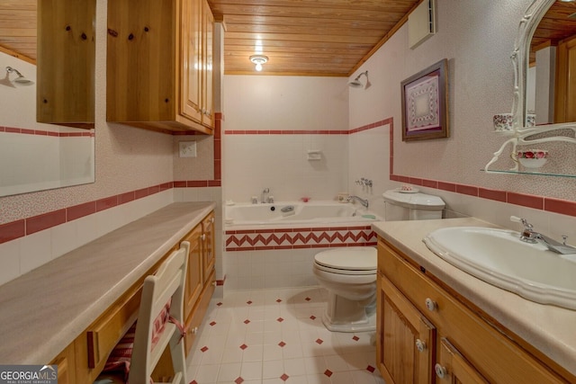 bathroom featuring tile patterned flooring, vanity, toilet, wooden ceiling, and tiled bath