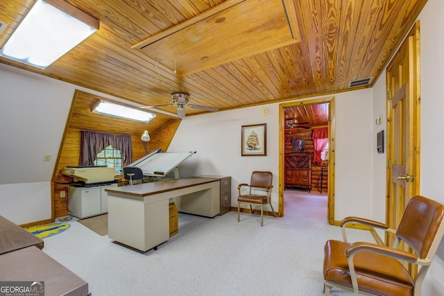home office with visible vents, attic access, wood ceiling, and light colored carpet
