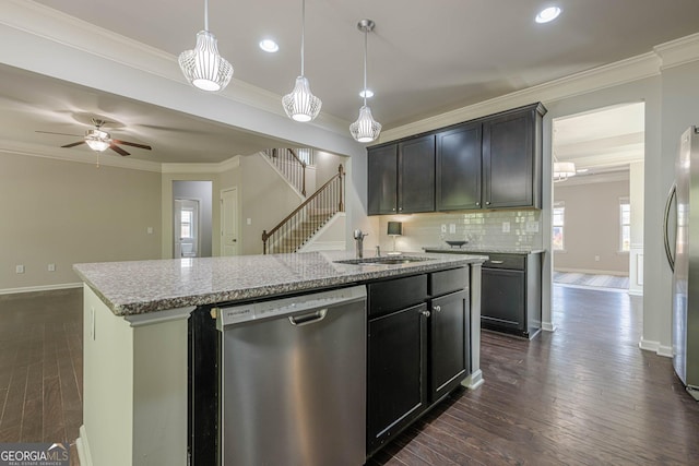 207 Cherokee Reserve Cir, Canton, GA 30115 - kitchen with a kitchen island with sink, stainless steel appliances, ornamental molding, dark wood-style flooring, and a sink