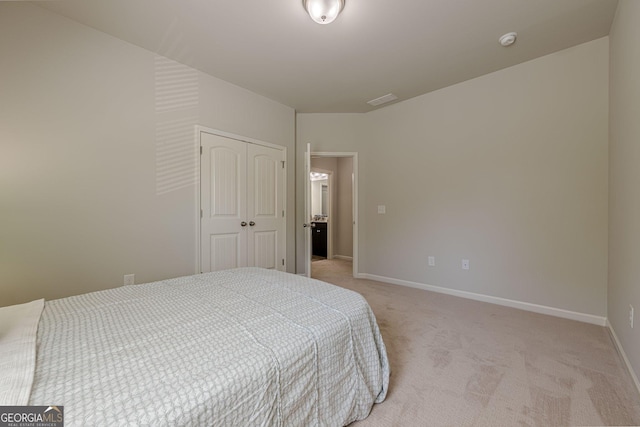 207 Cherokee Reserve Cir, Canton, GA 30115 - bedroom featuring visible vents, light carpet, baseboards, and a closet
