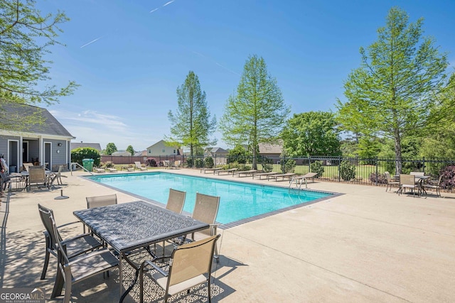 207 Cherokee Reserve Cir, Canton, GA 30115 - pool with fence, outdoor dining area, and a patio area