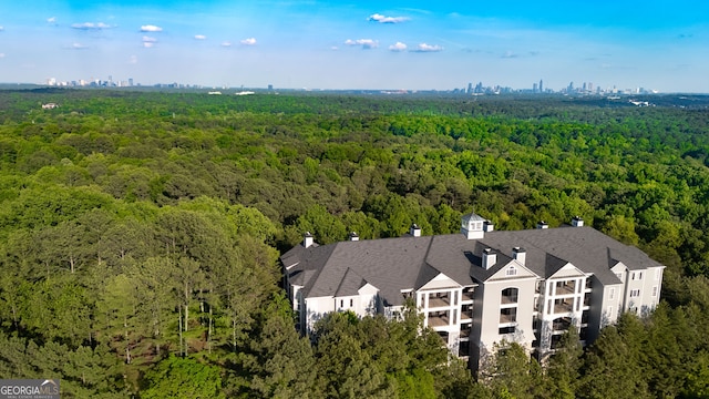 aerial view featuring a forest view