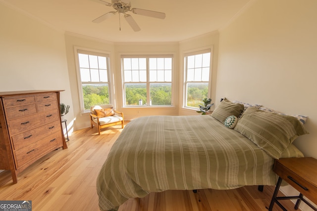 4100 Paces Walk SE Unit 4306, Atlanta, GA 30339 - bedroom with crown molding, light wood finished floors, a ceiling fan, and baseboards