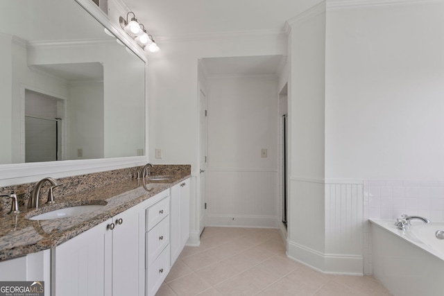 4100 Paces Walk SE Unit 4306, Atlanta, GA 30339 - bathroom featuring a stall shower, tile patterned flooring, a garden tub, wainscoting, and double vanity