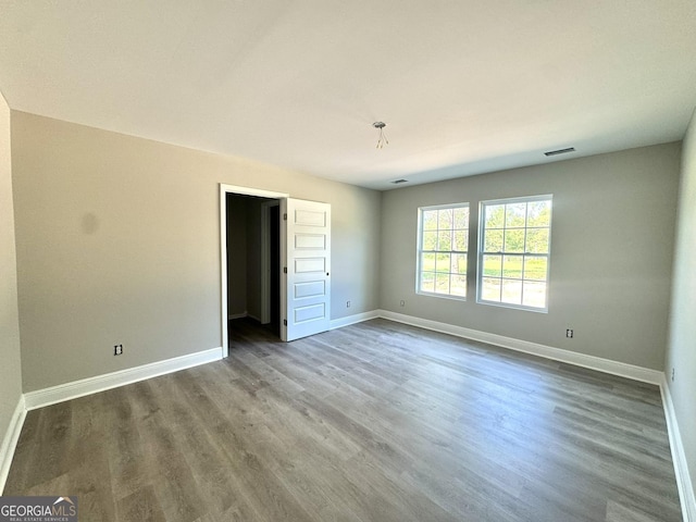 270 Abigail Cir, Ellabell, GA 31308 - empty room with baseboards and wood finished floors