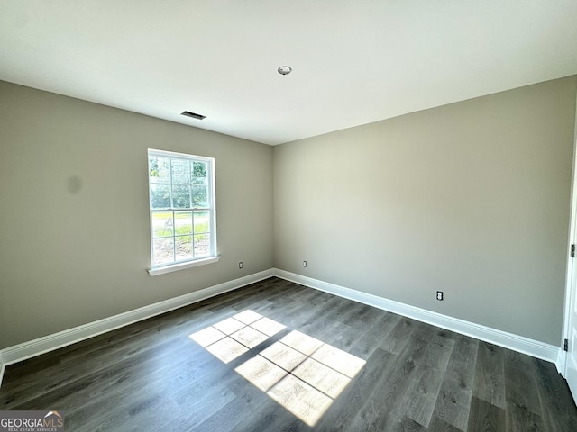 270 Abigail Cir, Ellabell, GA 31308 - empty room with baseboards and dark wood-style floors