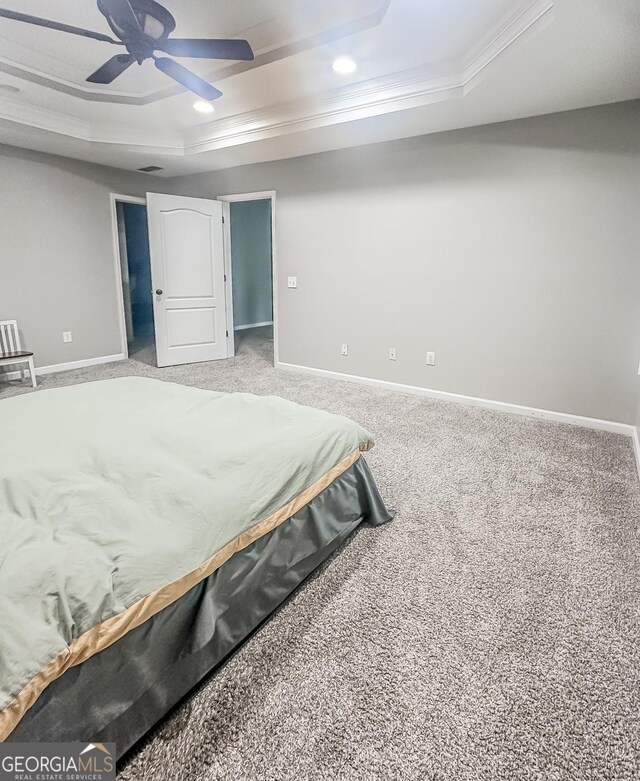 1485 Oglethorpe Run Ln, Suwanee, GA 30024 - bedroom featuring ornamental molding, carpet flooring, baseboards, and a tray ceiling
