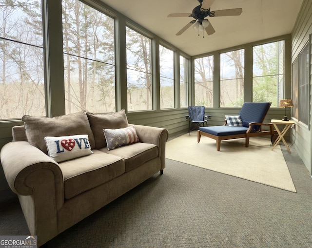 sunroom / solarium with ceiling fan and plenty of natural light
