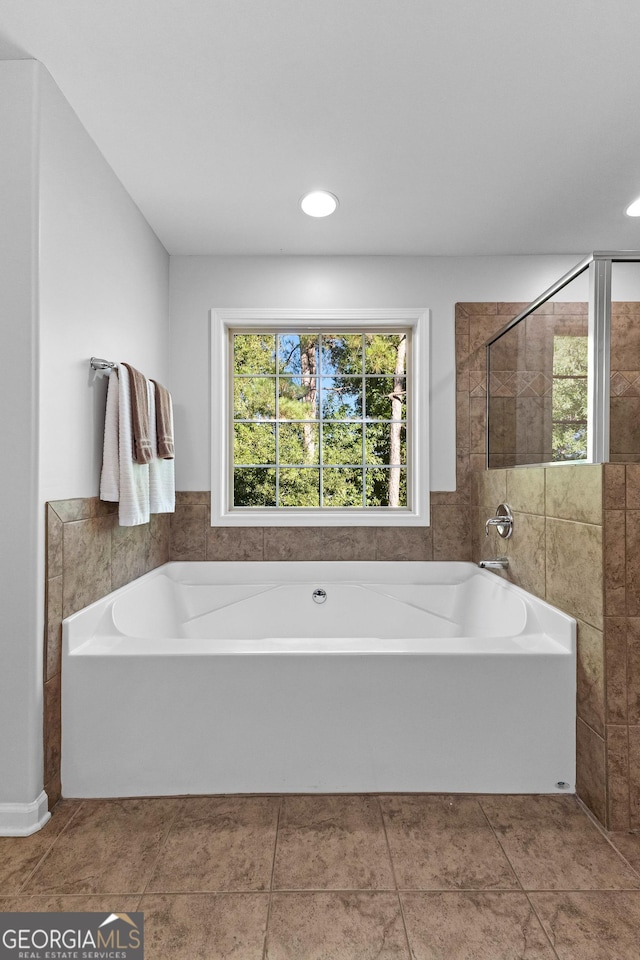 171 Cliffhaven Cir, Newnan, GA 30263 - bathroom with recessed lighting, tile patterned flooring, tiled shower, and a garden tub