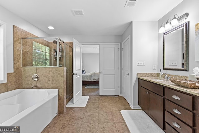 171 Cliffhaven Cir, Newnan, GA 30263 - full bath featuring vanity, visible vents, a garden tub, and a stall shower