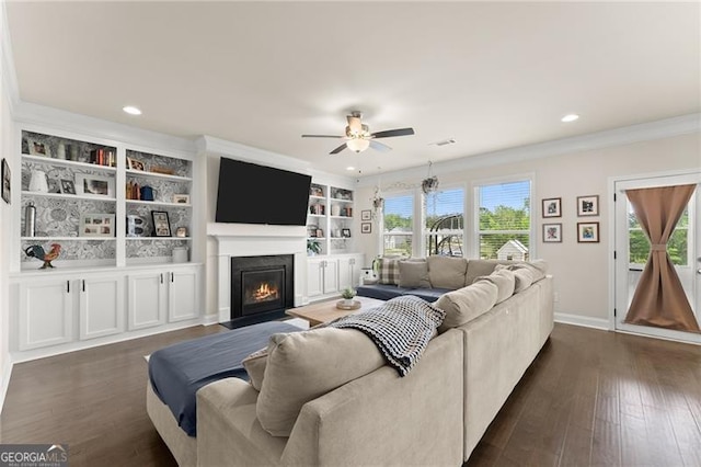 837 Porches Way, Dacula, GA 30019 - living room with ceiling fan, a fireplace with flush hearth, dark wood finished floors, recessed lighting, and ornamental molding