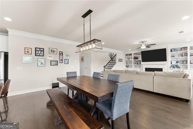 837 Porches Way, Dacula, GA 30019 - dining room featuring ceiling fan, crown molding, recessed lighting, stairs, and dark wood-style floors