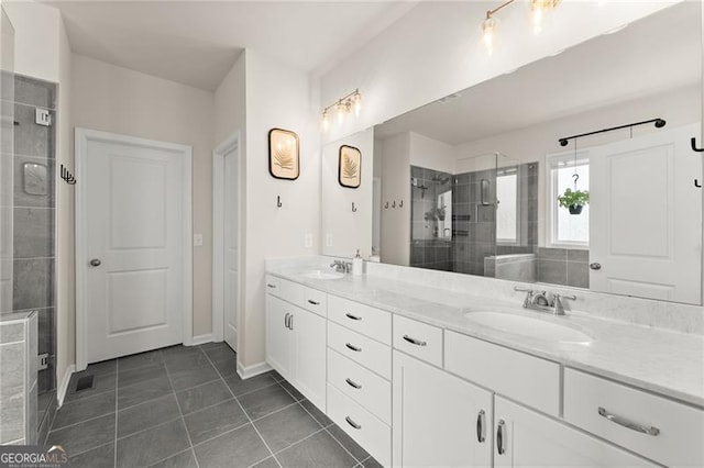 837 Porches Way, Dacula, GA 30019 - bathroom featuring double vanity, a shower stall, and tile patterned floors