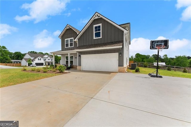 837 Porches Way, Dacula, GA 30019 - craftsman inspired home featuring board and batten siding, a garage, concrete driveway, and brick siding