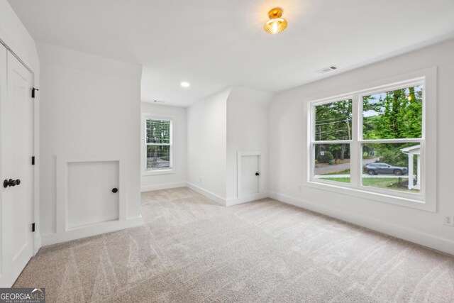 1347 Midlawn Dr, Decatur, GA 30032 - interior space with baseboards, visible vents, a healthy amount of sunlight, and carpet floors