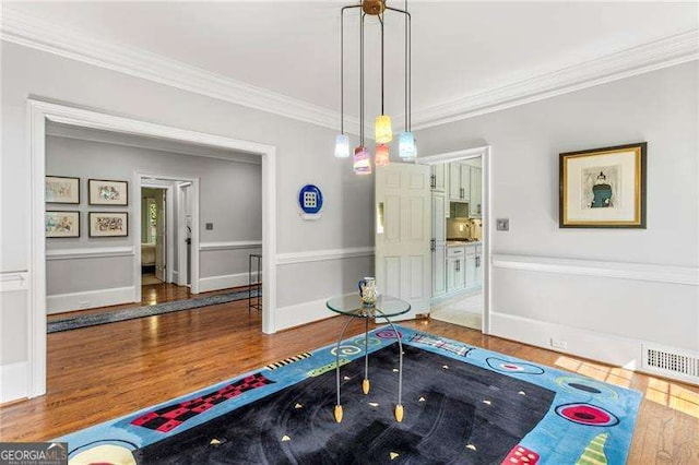 3720 Harts Pl, Atlanta, GA 30341 - interior space featuring wood finished floors, crown molding, and visible vents