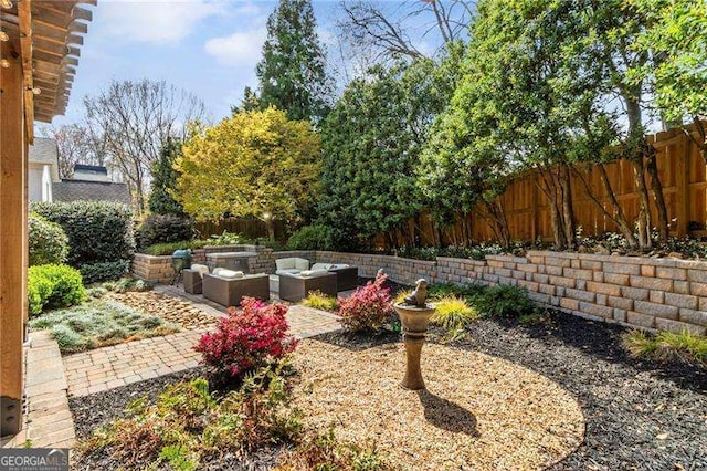 3720 Harts Pl, Atlanta, GA 30341 - view of yard with a patio, an outdoor living space, and a fenced backyard