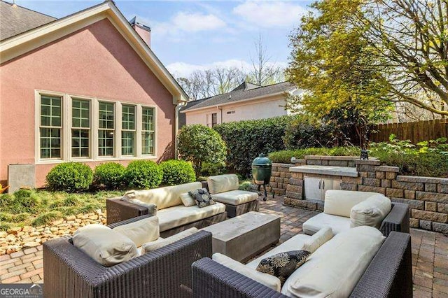 3720 Harts Pl, Atlanta, GA 30341 - view of patio featuring an outdoor living space and a fenced backyard