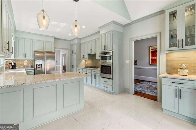 3720 Harts Pl, Atlanta, GA 30341 - kitchen featuring tasteful backsplash, stainless steel appliances, a peninsula, and a sink