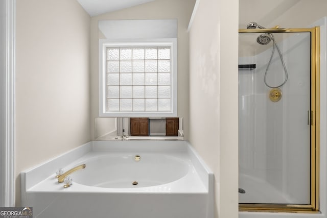 1452 Evanston Ln, Marietta, GA 30062 - full bathroom featuring a stall shower, a bath, and lofted ceiling