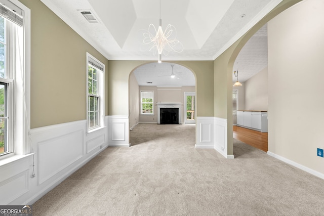 1452 Evanston Ln, Marietta, GA 30062 - interior space with an inviting chandelier, a fireplace, a wainscoted wall, visible vents, and arched walkways