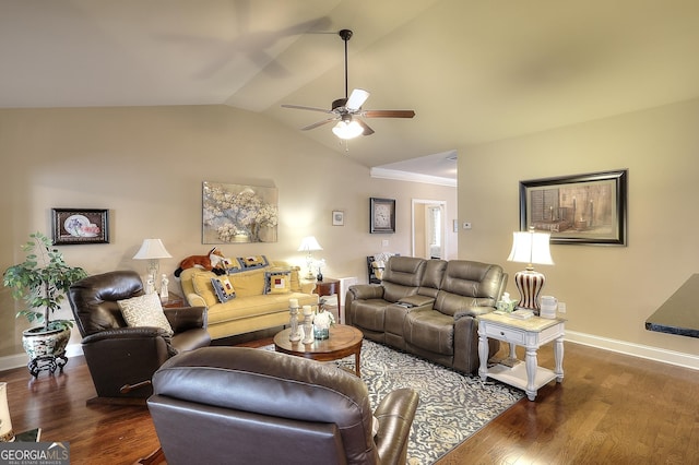 living area with lofted ceiling, ceiling fan, wood finished floors, and baseboards