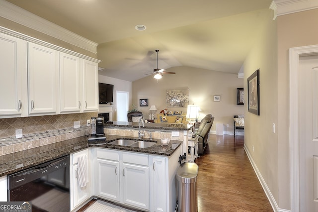 kitchen with ceiling fan, dishwasher, a sink, a peninsula, and open floor plan