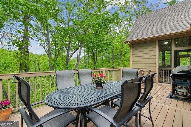 deck featuring outdoor dining space