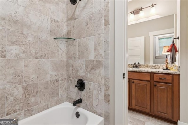bathroom with bathtub / shower combination and vanity