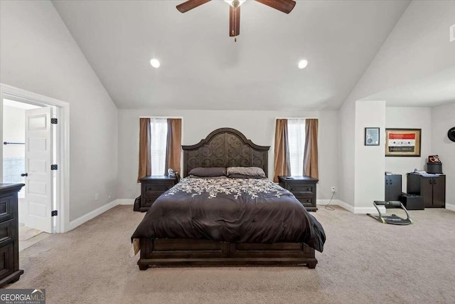 bedroom featuring light colored carpet, multiple windows, and lofted ceiling