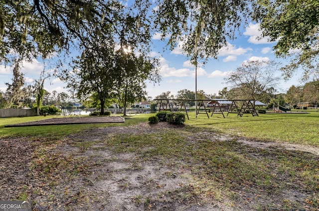 view of home's community with a lawn