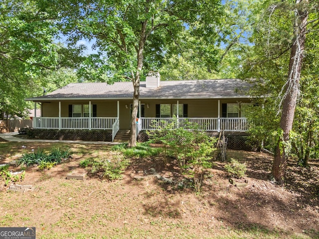 3592 Lakeview Dr, Gainesville, GA 30501 - single story home with a chimney and a porch