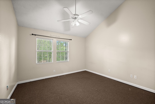 3592 Lakeview Dr, Gainesville, GA 30501 - unfurnished room with a ceiling fan, dark carpet, lofted ceiling, and baseboards