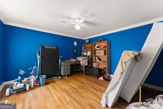 5855 Willis Ln, Cumming, GA 30040 - bedroom with visible vents, baseboards, ornamental molding, wood finished floors, and a ceiling fan