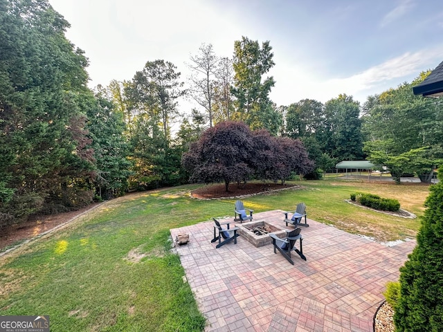 3550 N Bogan Rd, Buford, GA 30519 - view of patio / terrace featuring a fire pit
