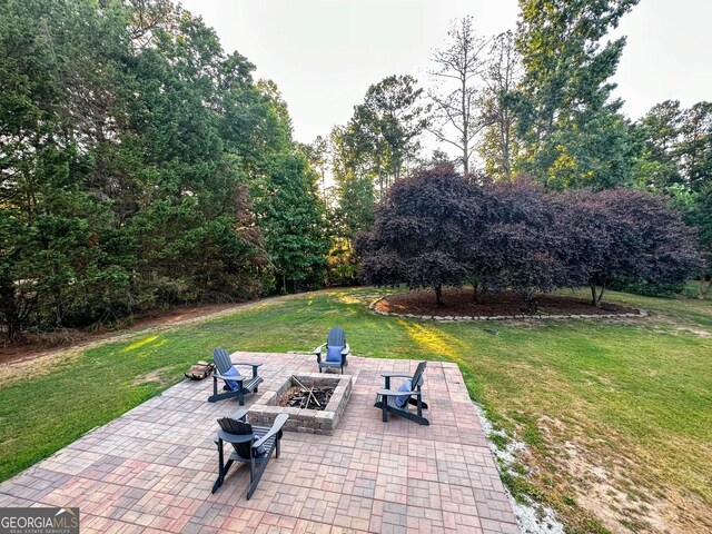 3550 N Bogan Rd, Buford, GA 30519 - view of patio / terrace with a fire pit