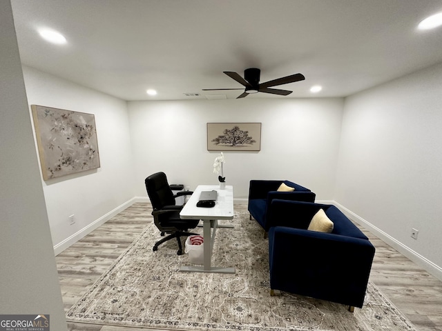 office space with wood finished floors, ceiling fan, recessed lighting, and baseboards