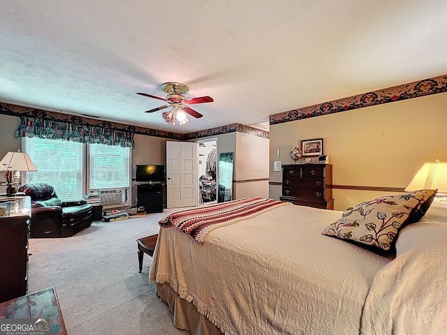 bedroom with carpet flooring and a ceiling fan