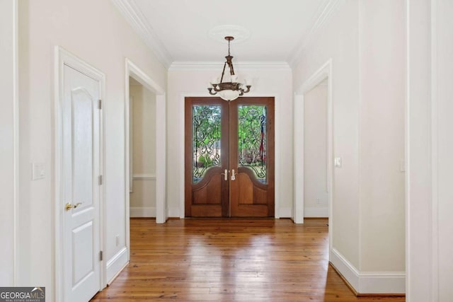 145 Havenbrooke Ct, Fayetteville, GA 30214 - entryway with baseboards, ornamental molding, french doors, and wood-type flooring