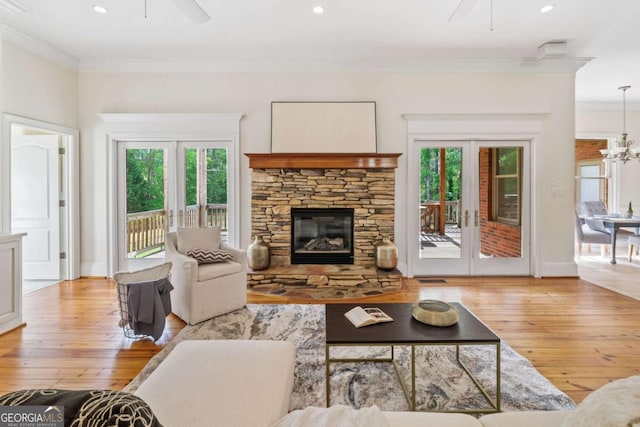 145 Havenbrooke Ct, Fayetteville, GA 30214 - living room with hardwood / wood-style floors, ceiling fan with notable chandelier, and crown molding