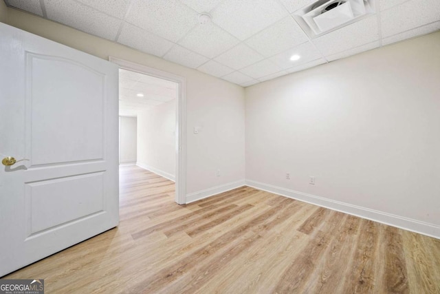 145 Havenbrooke Ct, Fayetteville, GA 30214 - empty room with baseboards, visible vents, wood finished floors, and a paneled ceiling