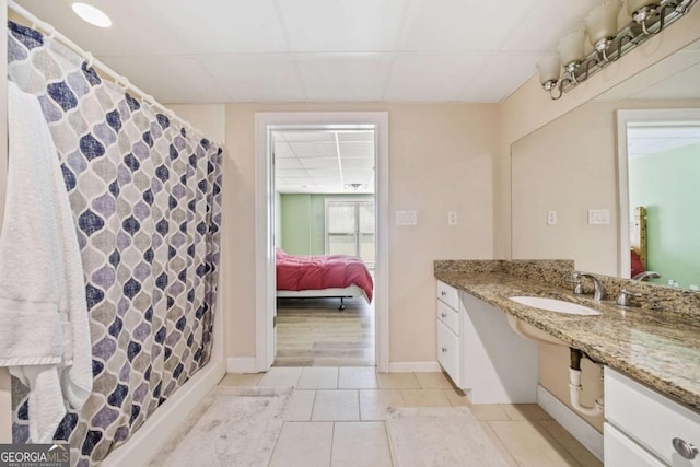 145 Havenbrooke Ct, Fayetteville, GA 30214 - ensuite bathroom featuring curtained shower, ensuite bathroom, baseboards, a paneled ceiling, and tile patterned flooring