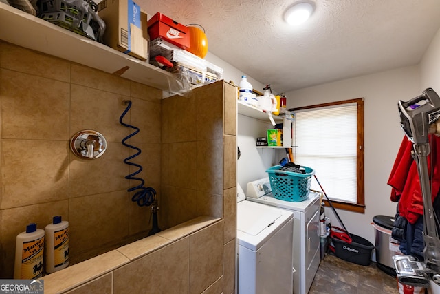 clothes washing area featuring independent washer and dryer